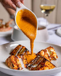 Sanjh Restaurant and Bar signature dishes  Butter Chicken, Lamb Shank Rogan Josh, Tandoori Sea Bass, Paneer Tikka Masala.